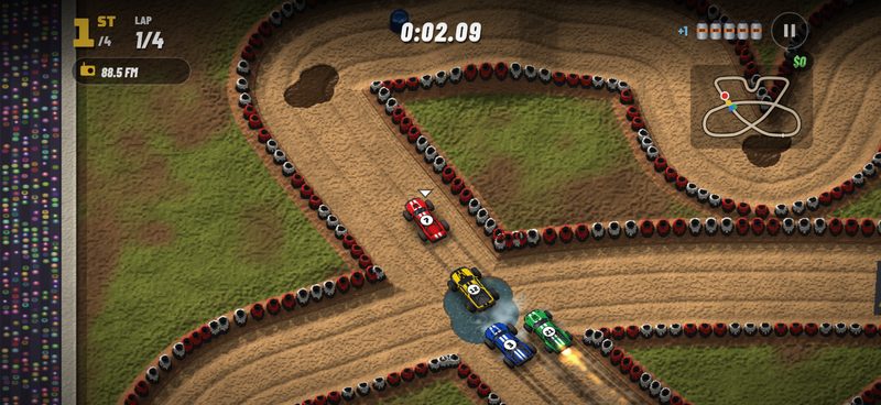 Four race trucks splash through a puddle where two parts of the Triple Cross track cross, with position, lap, timer, nitro cans and the track map on screen
